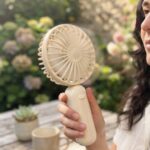 PORTABLE PLASTIC HAND FAN - MINI - AAA batteries (not included)