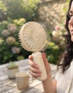 PORTABLE PLASTIC HAND FAN - MINI - AAA batteries (not included)