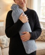 LONG HOT WATER BOTTLE W/ASST FLUFFY COVER